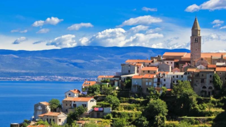 Adriatic Town of Vrbnik in front of blue sea, Island of Krk, Croatia
